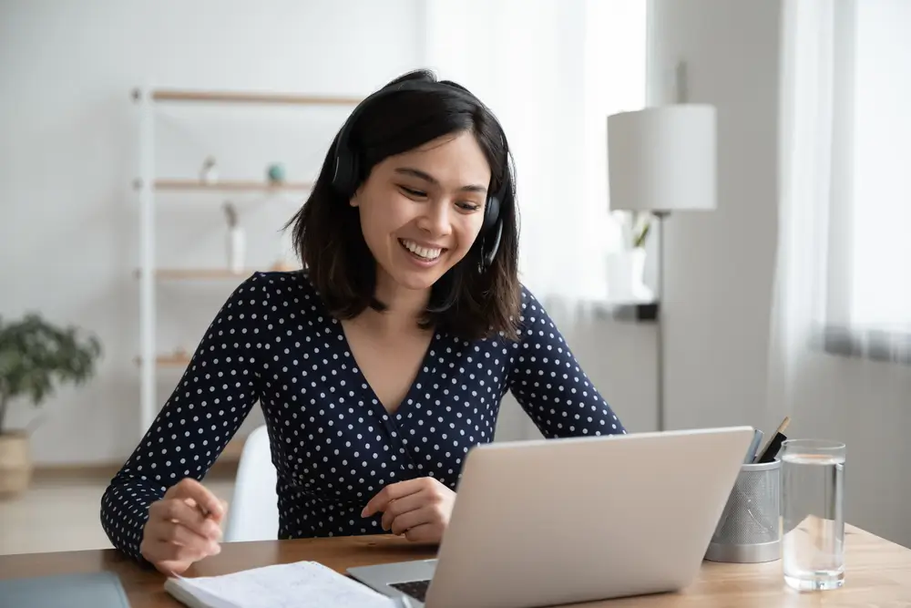 virtual assistant woman in headset with microphone involved in video call conference conversation