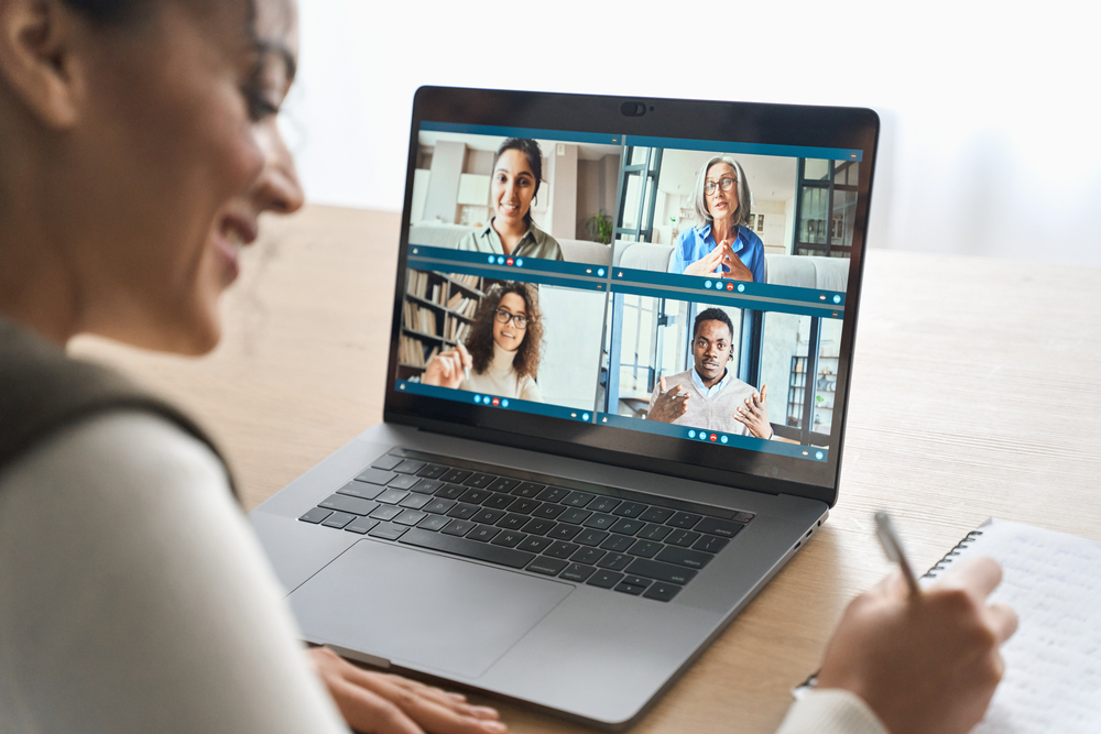 Happy smiling women having virtual meeting with diverse people online