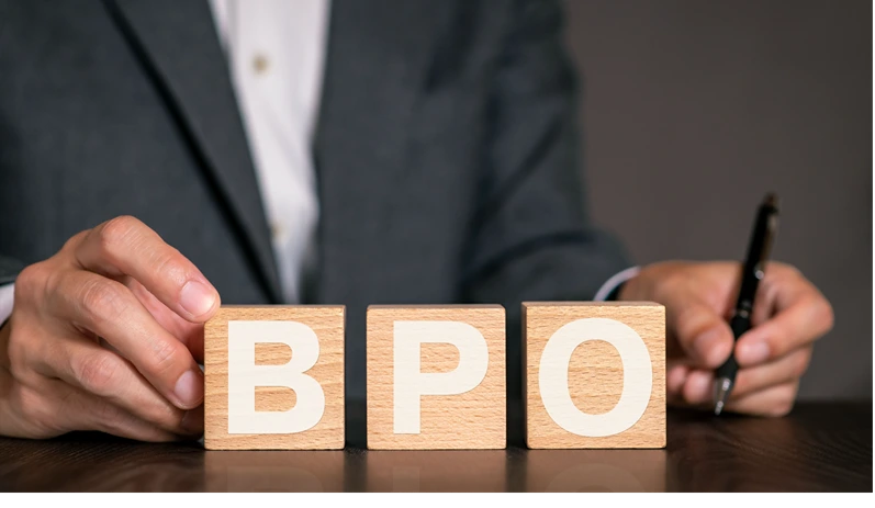 There is wood cube with the word BPO. It is an abbreviation for Business Process Outsourcing as eye-catching image.